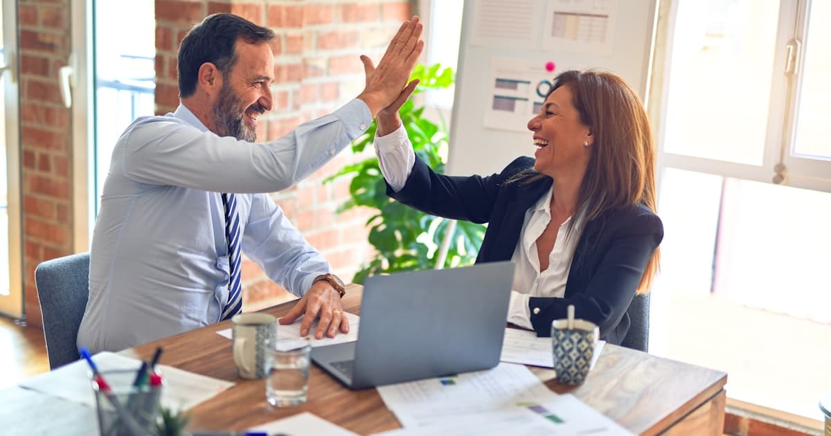 Happy business professionals in an office